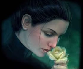 Woman smelling rose