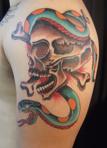 A Skull Eating a Snake only the Design of Tribal Tattoo 