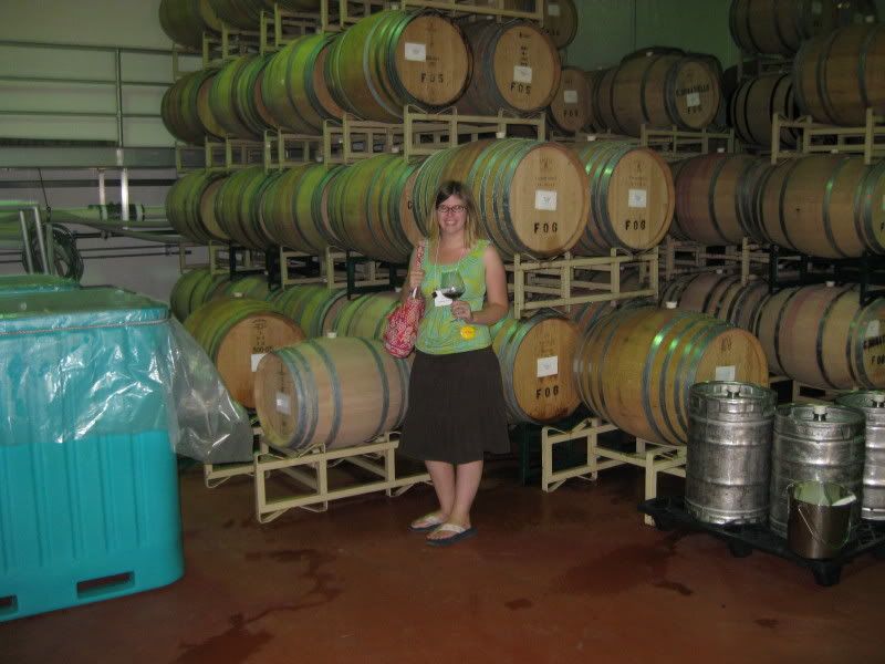 Merlot or Cuvee? Merlot or Cuvee? Me in one of the barrel rooms